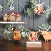 Christmas Highland Cow With Bagpipes On Block