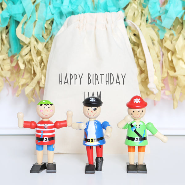 Three Wooden Flexible Pirates And Personalised Bag